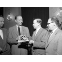Show 1950s Reuther signing Ford contract Image